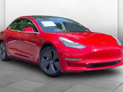 2018 Tesla Model 3 Long Range Battery in Red — front three-quarter view