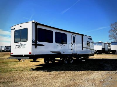 2026 East to West Longitude — rear three-quarter view
