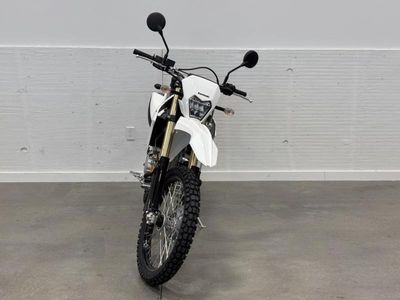 2026 Kawasaki KLX300 in BRIGHT WHITE — front three-quarter view