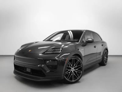 2026 Porsche Macan Macan 4 Electric in Volcano Grey Metallic — front three-quarter view