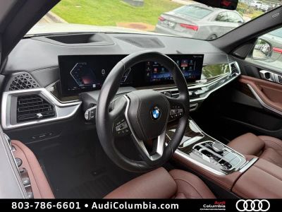 2024 BMW X5 — rear three-quarter view