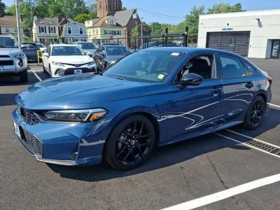 2025 Honda Civic — rear three-quarter view