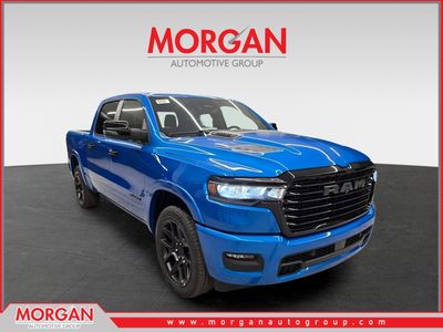 2026 Ram 1500 Laramie in Hydro Blue Pearlcoat — front three-quarter view