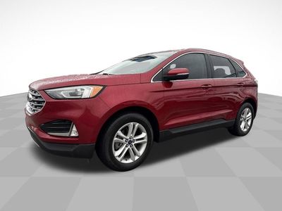 2020 Ford Edge SEL in Red — front three-quarter view