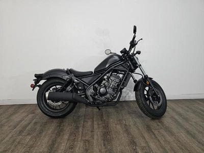 2025 Honda Rebel 300 in MATTE BLACK METALLIC — front three-quarter view