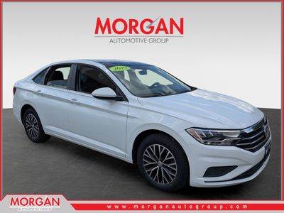 2019 Volkswagen Jetta 1.4T SE in Pure White — front three-quarter view