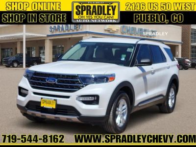 2021 Ford Explorer XLT in White — front three-quarter view