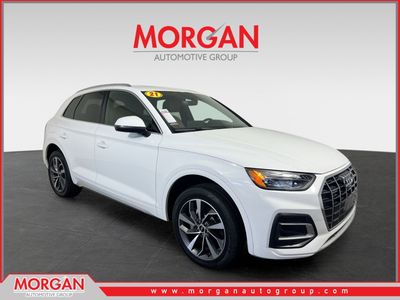 2021 Audi Q5 45 Premium Plus in Ibis White — front three-quarter view