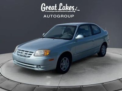 2005 Hyundai Accent GLS in Glacier Blue — front three-quarter view