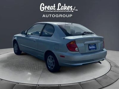 2005 Hyundai Accent — rear three-quarter view