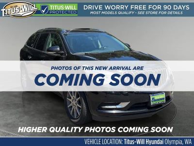 2016 Buick Enclave Leather Group in Black — front three-quarter view