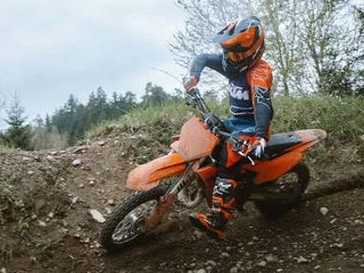 2027 KTM 65 SX — front three-quarter view