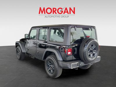 2026 Jeep Wrangler — rear three-quarter view
