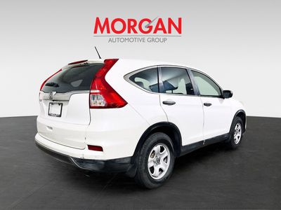 2015 Honda CR-V — rear three-quarter view
