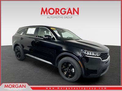 2023 Kia Sorento LX in Ebony Black — front three-quarter view
