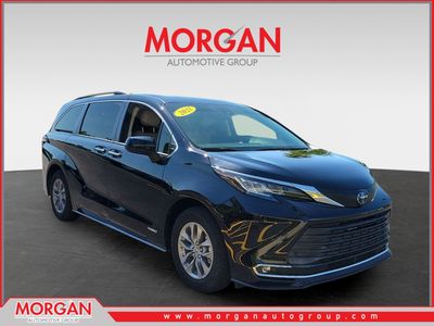 2021 Toyota Sienna XLE in Midnight Black Metallic — front three-quarter view