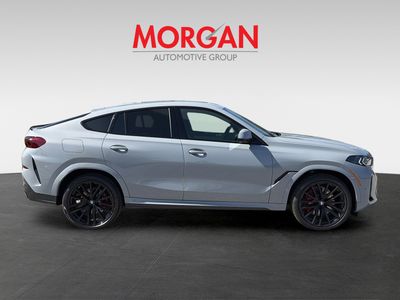 2026 BMW X6 — rear three-quarter view