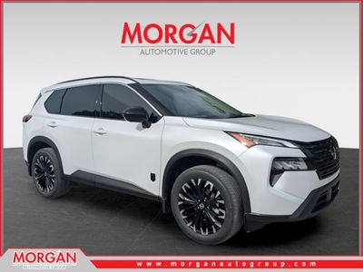 2026 Nissan Rogue Dark Armor in White — front three-quarter view