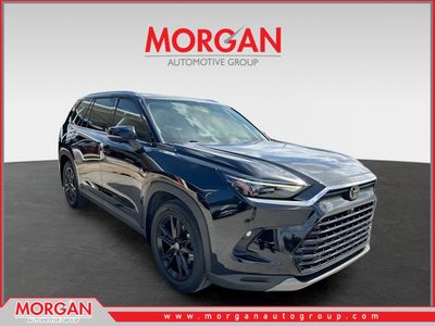2024 Toyota Grand Highlander Limited in Midnight Black Metallic — front three-quarter view