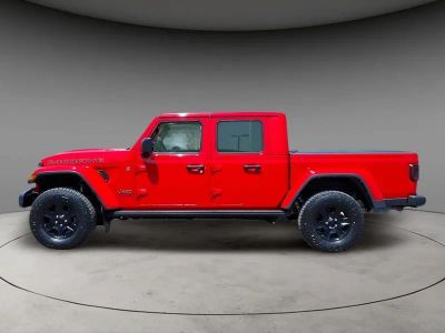 2021 Jeep Gladiator Mojave in Firecracker Red Clearcoat — front three-quarter view