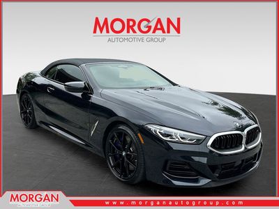 2024 BMW 8 Series M850i xDrive in Black — front three-quarter view