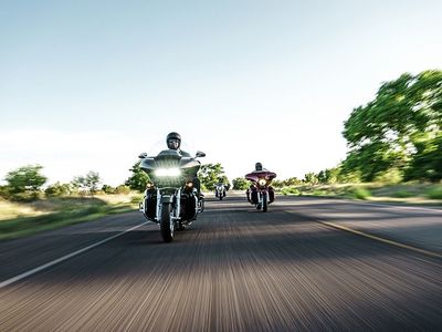 2016 Harley-Davidson CVO Street Glide FLHXSE in Carbon Crystal with Phantom Flames — front three-quarter view
