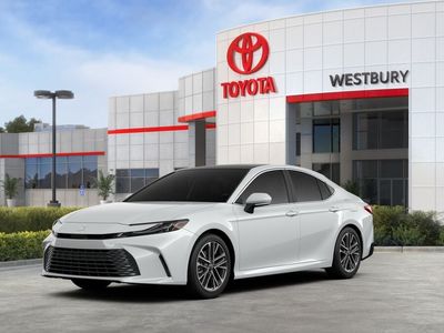 2026 Toyota Camry XLE AWD in Wind Chill Pearl — front three-quarter view