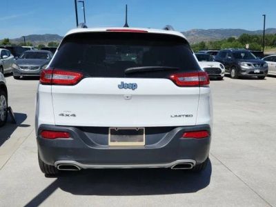 2015 Jeep Cherokee — rear three-quarter view