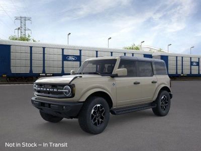 2026 Ford Bronco Outer Banks in Desert Sand — front three-quarter view