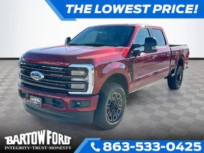 2026 Ford F-250SD Platinum 4WD CREW CAB in Ruby Red Metallic — front three-quarter view