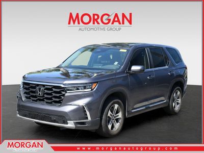 2024 Honda Pilot EX-L 7 Passenger in Modern Steel Metallic — front three-quarter view