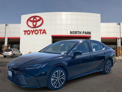 2026 Toyota Camry XLE in Midnight Black Met — front three-quarter view