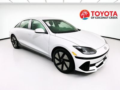 2024 Hyundai IONIQ 6 SE in Serenity White — front three-quarter view