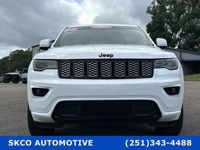 2020 Jeep Grand Cherokee in Bright White Clearcoat — front three-quarter view