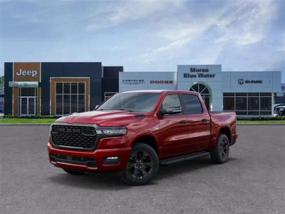 2026 RAM Ram 1500 RAM 1500 BIG HORN CREW CAB 4X4 5'7' BOX in Molten Red Pearl-Coat Exterior Paint — front three-quarter view