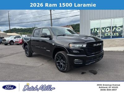 2026 RAM 1500 Laramie in Diamond Black Crystal Pearlcoat — front three-quarter view