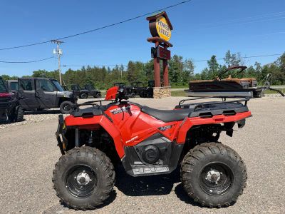 2025 Polaris SPORTSMAN 570 EPS in ORANGE RUST — front three-quarter view