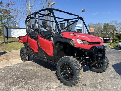 2025 Honda Pioneer 1000-6 Deluxe Crew in RED — front three-quarter view
