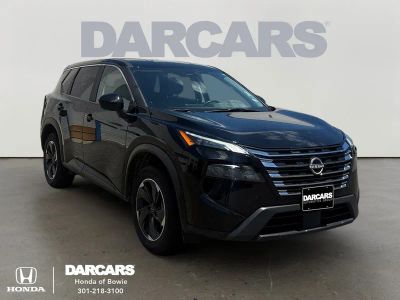 2025 Nissan Rogue SV in Super Black — front three-quarter view