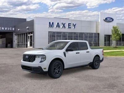 2026 Ford Maverick XLT in Oxford White — front three-quarter view