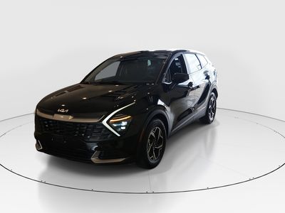 2025 Kia Sportage — rear three-quarter view
