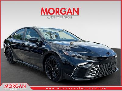 2026 Toyota Camry SE in Midnight Black Metallic — front three-quarter view