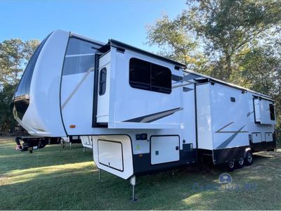 2022 Forest River Cedar Creek — rear three-quarter view