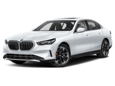 2026 BMW 5 Series 530i in Alpine White — front three-quarter view