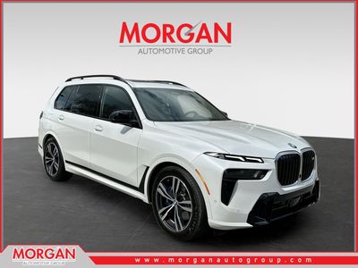 2025 BMW X7 M60i in White — front three-quarter view