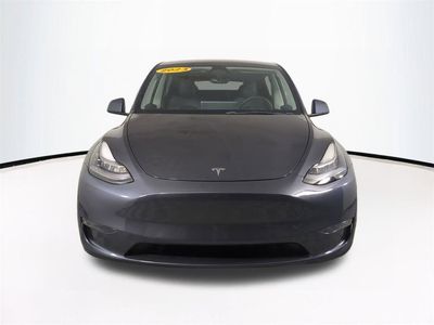 2023 Tesla Model Y — rear three-quarter view
