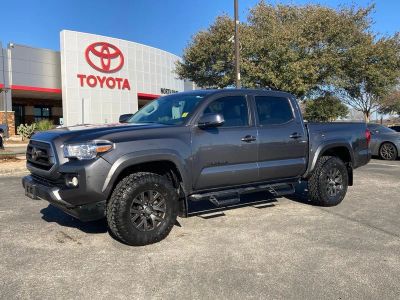 2023 Toyota Tacoma SR5 in Magnetic Gray Metallic — front three-quarter view