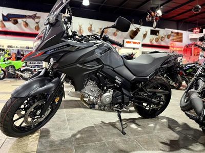 2024 Suzuki V-Strom 650 in Solid Iron Gray — front three-quarter view