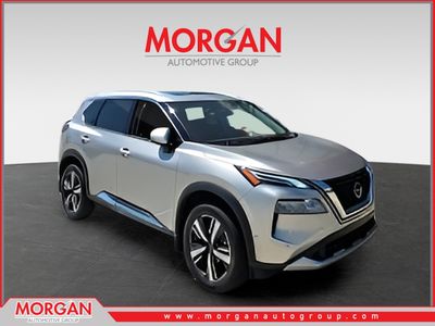 2023 Nissan Rogue Platinum in Gold — front three-quarter view
