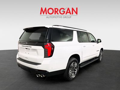 2025 Chevrolet Suburban — rear three-quarter view